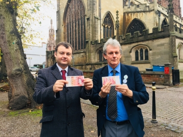 Councillors Ridley and Bailey near Holy Trinity Church in Coventry