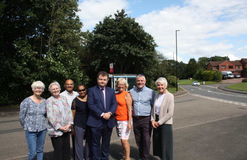 Cllr Gary Ridley (centre) with Cllr Julia Lepoidevin (wearing orange) next to Cllr Peter Male. It was taken with residents and representatives of the Allesley Green Residents Association at the bus stop on Woodridge Avenue (17/7/23). 